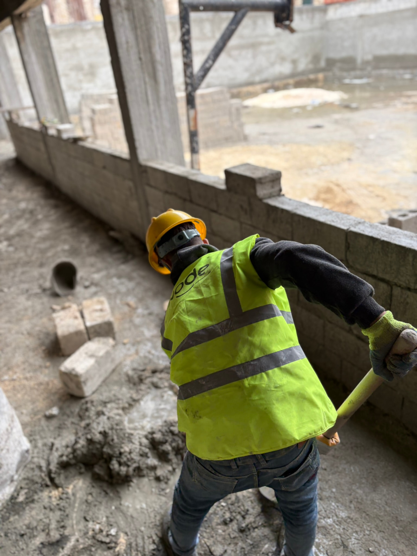 Node Construction worker carrying out masonry work
